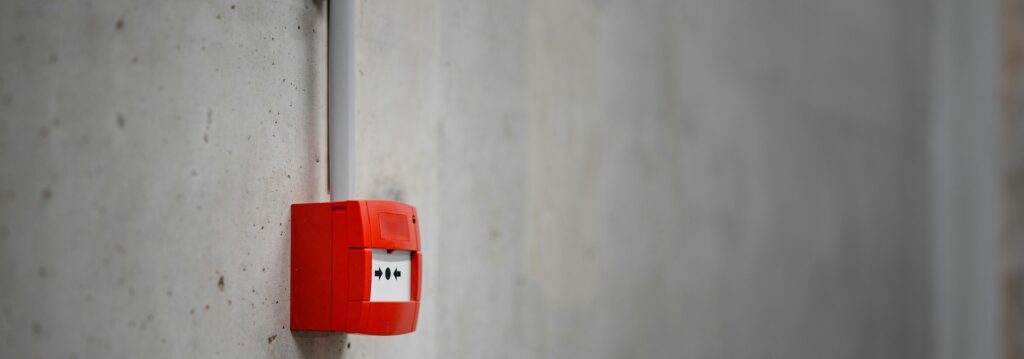 A fire alarm box shows the problem of constant alarm notifications.