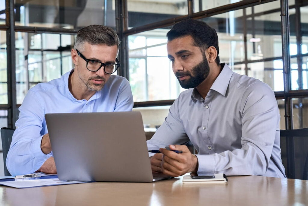 Two men decide the order of proactive jobs to keep their databases running smoothly.