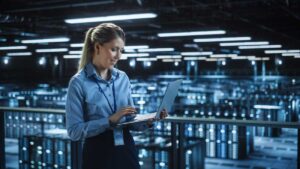 a woman implements database scaling best practices