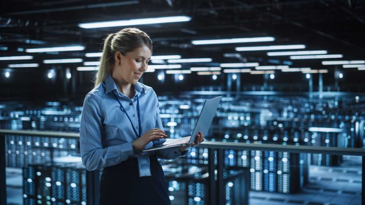 a woman implements database scaling best practices